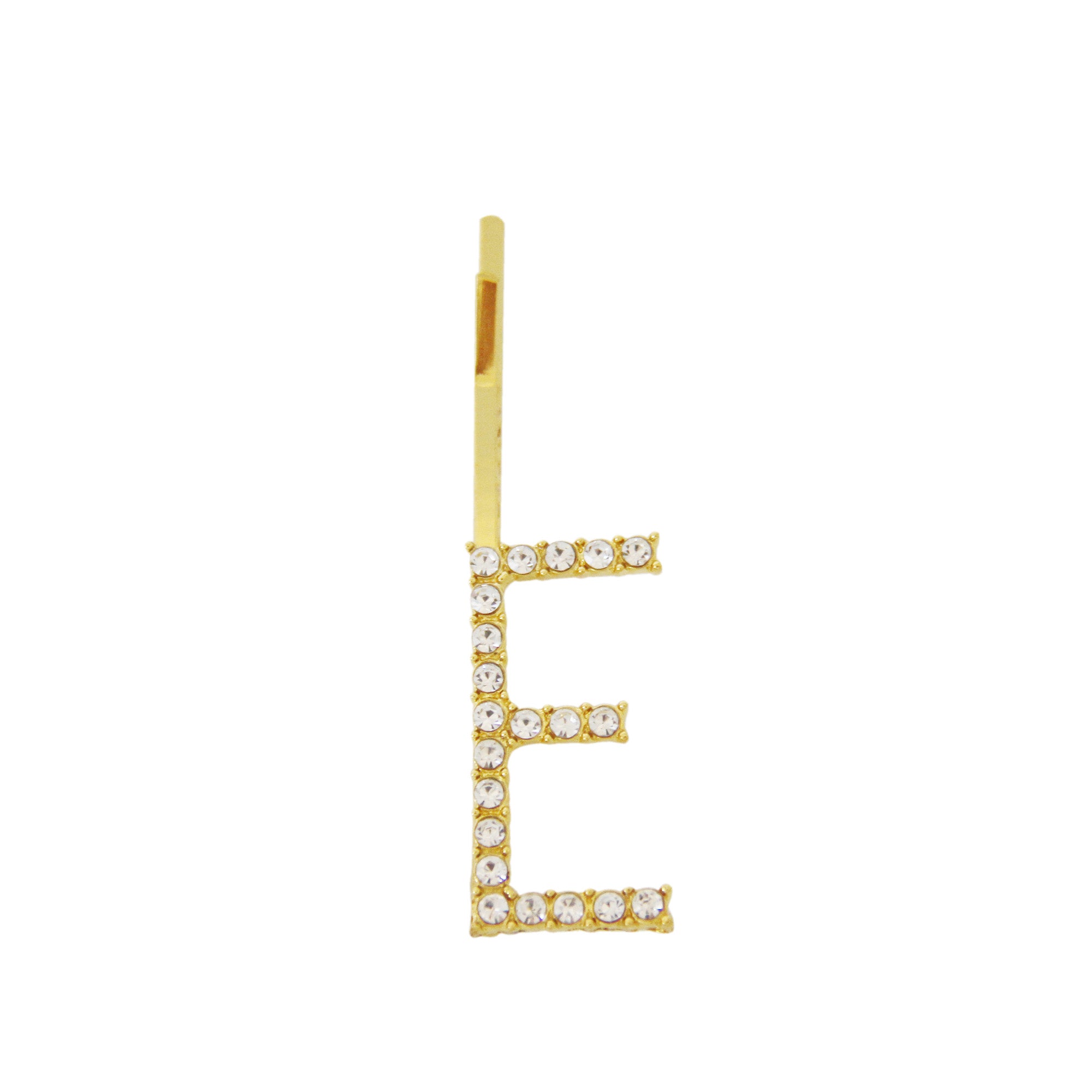 Gold and crystal letter 'E' hair slide on a white background