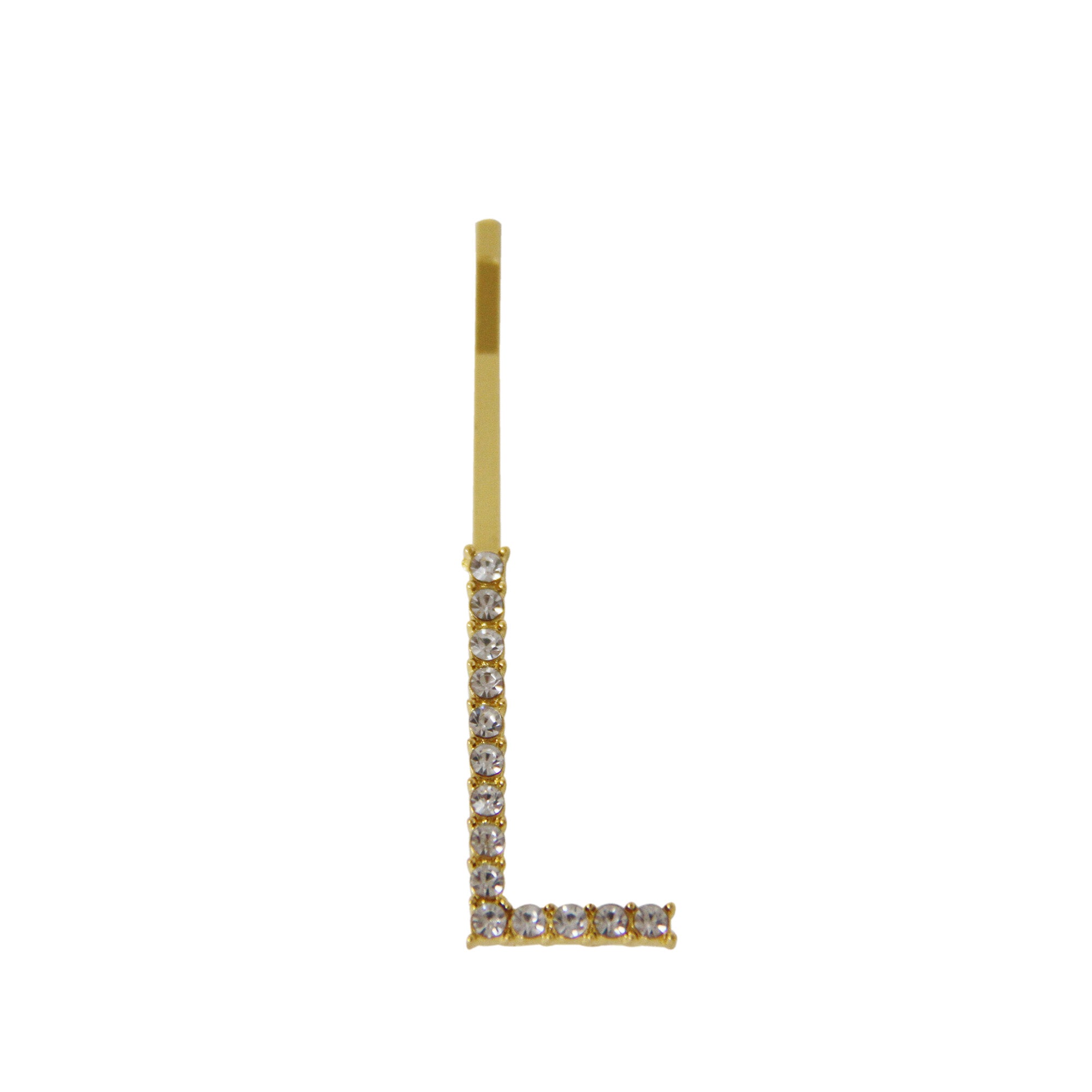 Gold and crystal letter 'L' hair slide on a white background