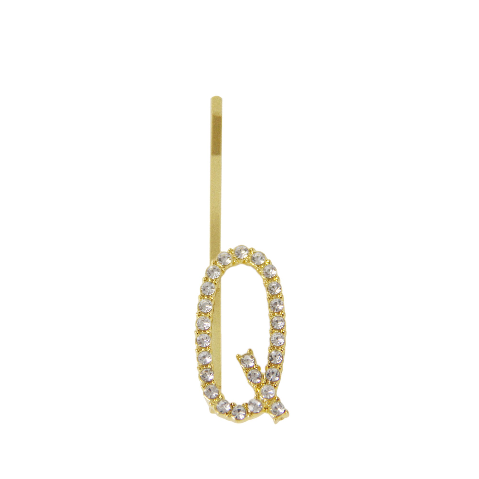 Gold and crystal letter 'Q' hair slide on a white background