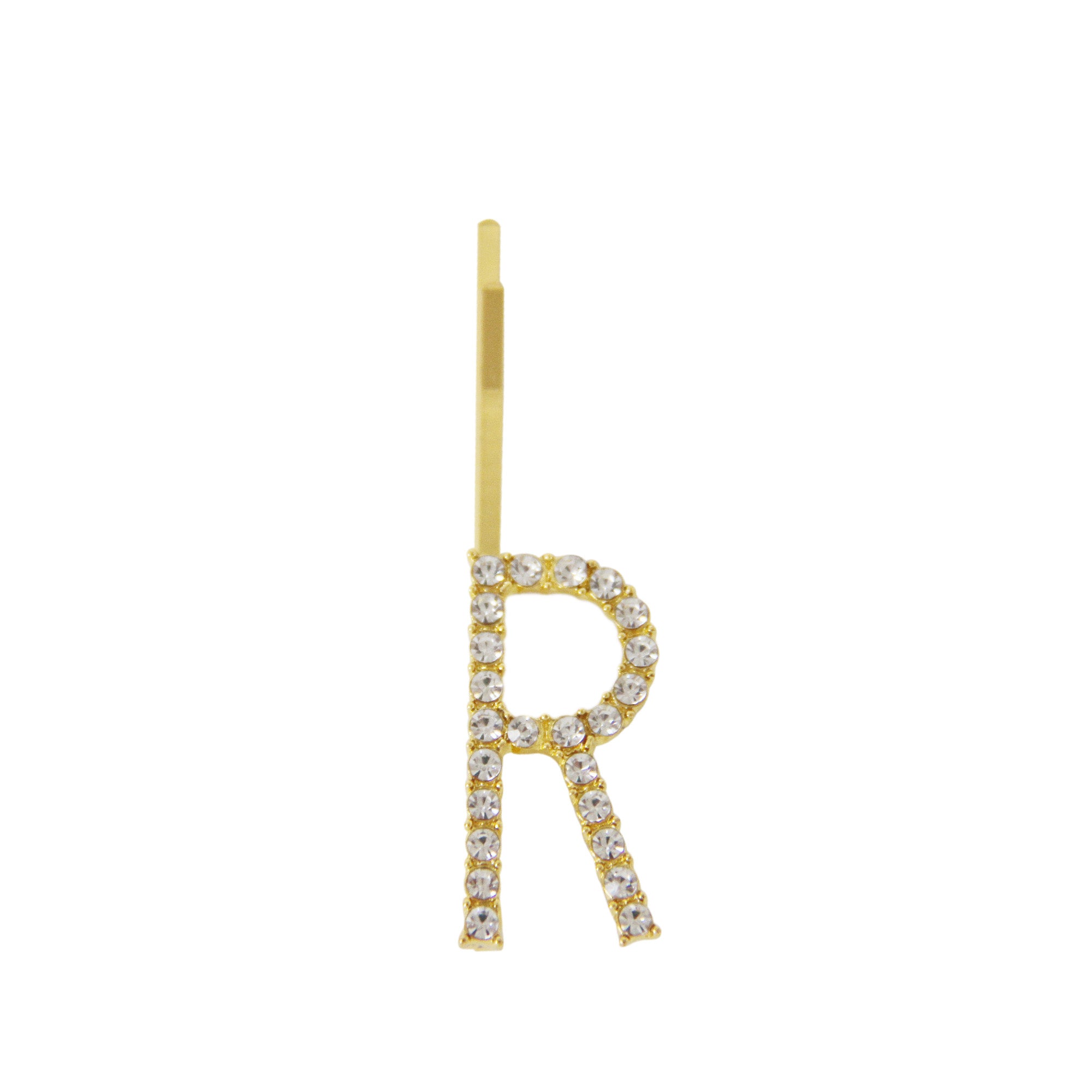 Gold and crystal letter 'R' hair slide on a white background