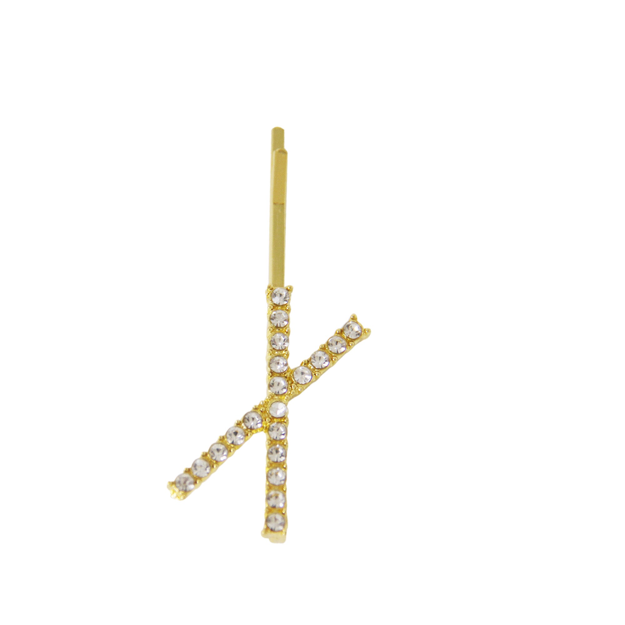 Gold and crystal letter 'X' hair slide on a white background