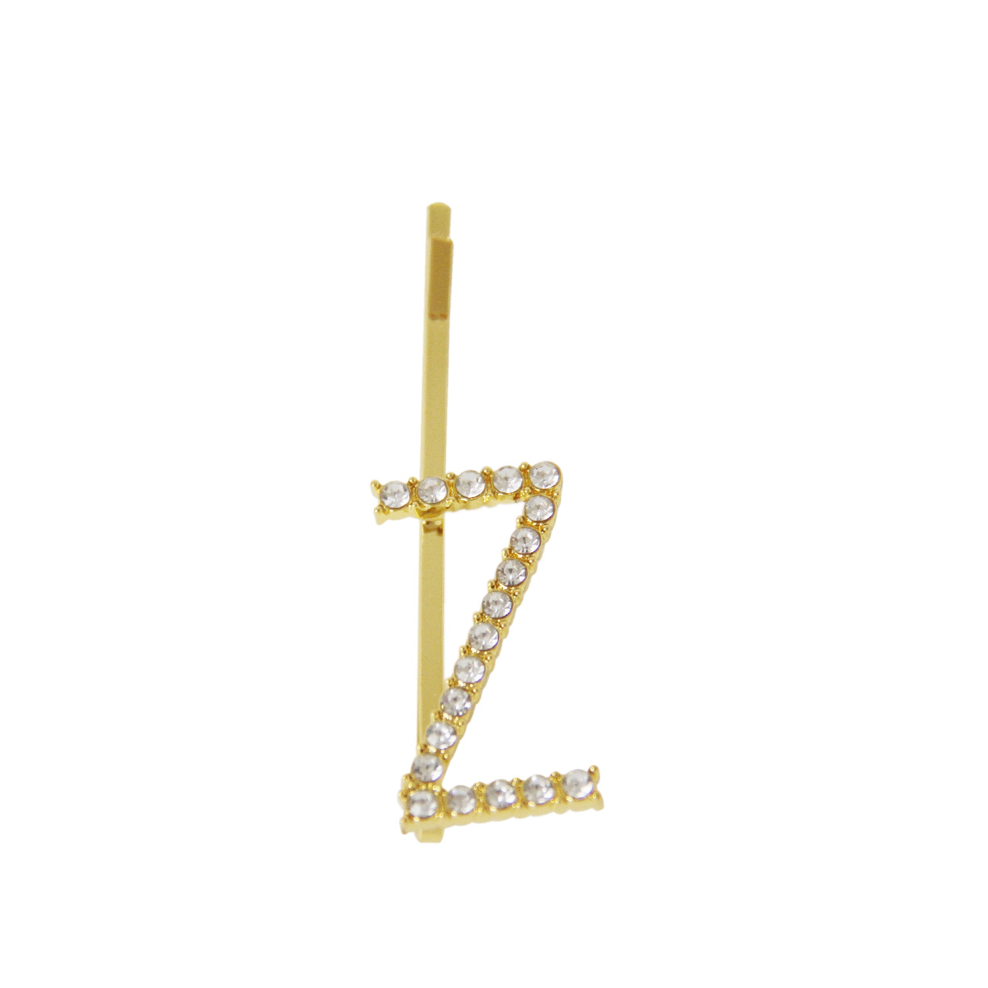 Gold and crystal letter 'Z' hair slide on a white background