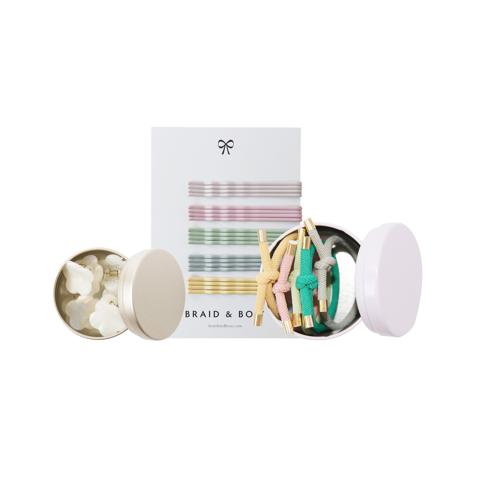 Set of hair accessories including hair ties and clips with a 'Braid & Bow' packaging on a white background.