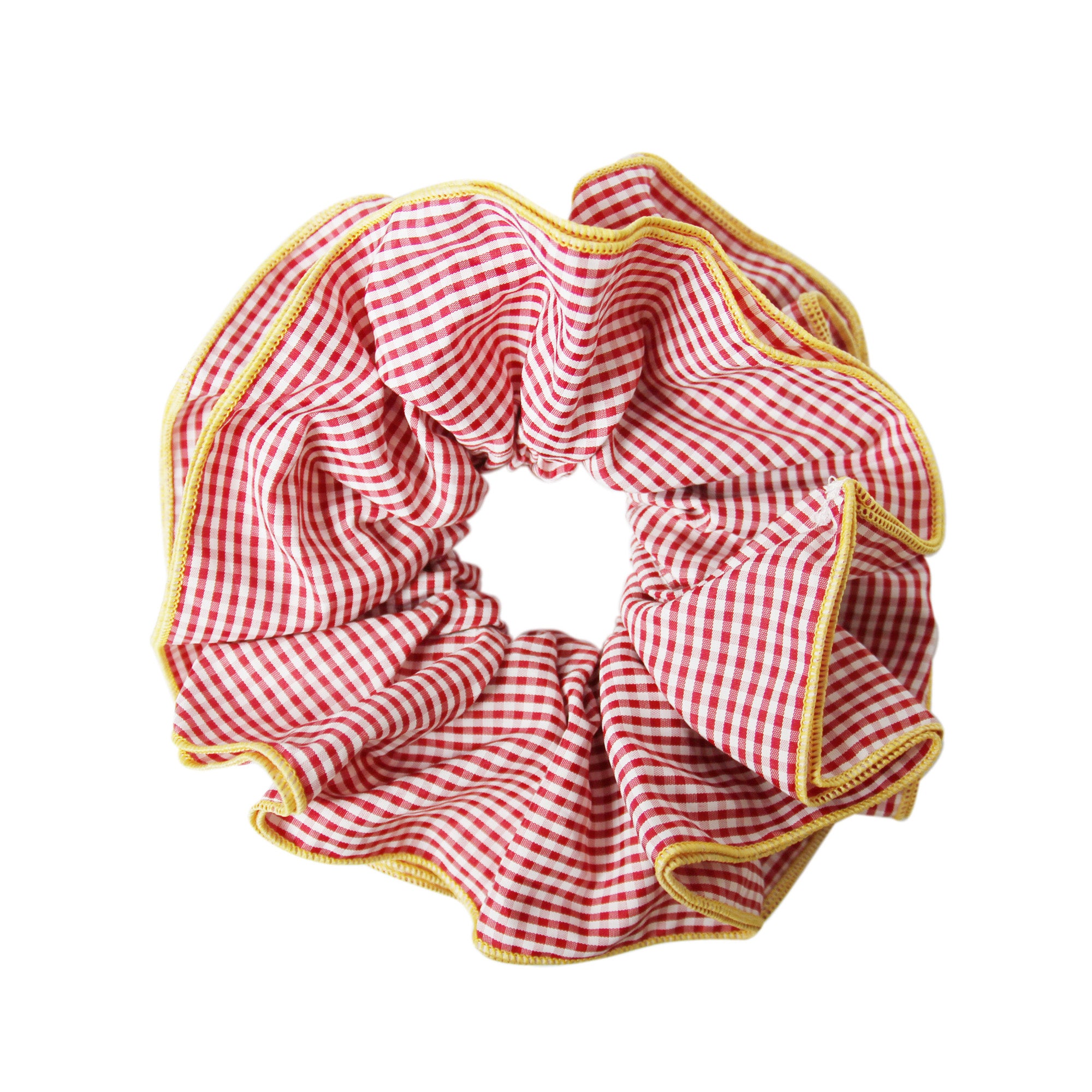 Red gingham scrunchie with a yellow trim on a white background