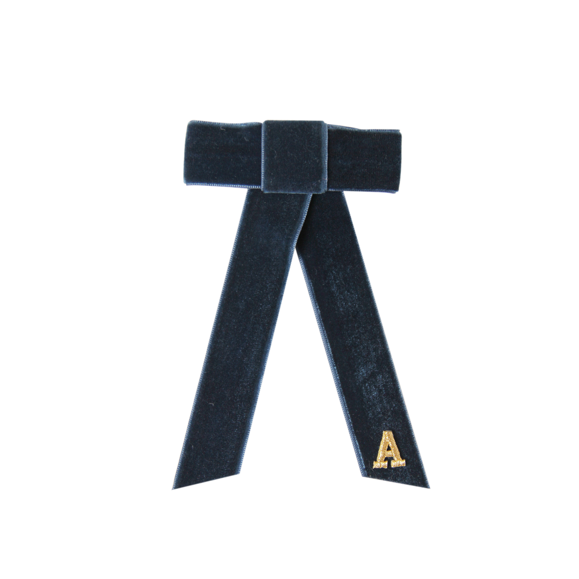 Monogrammed blue velvet hair bow with a gold letter 'A' on a white background