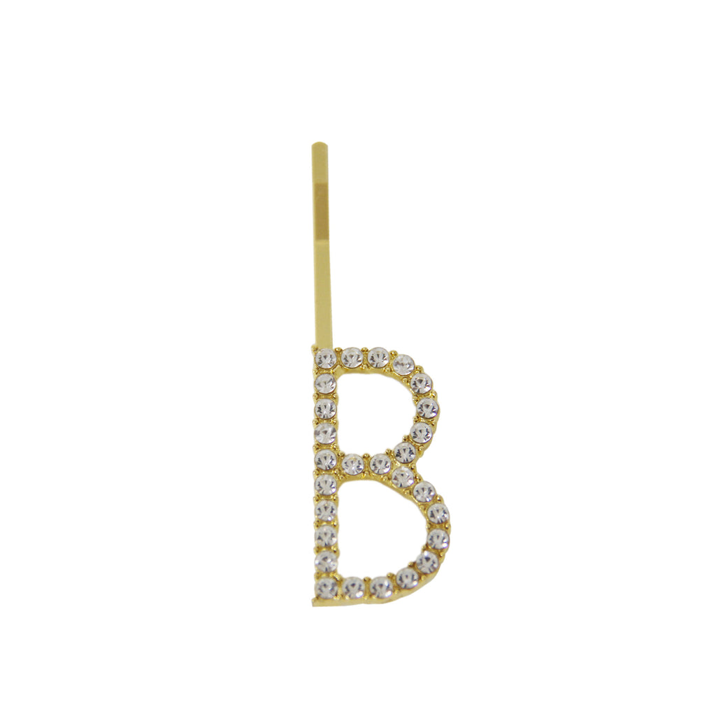 Gold and crystal letter 'B' hair slide on a white background