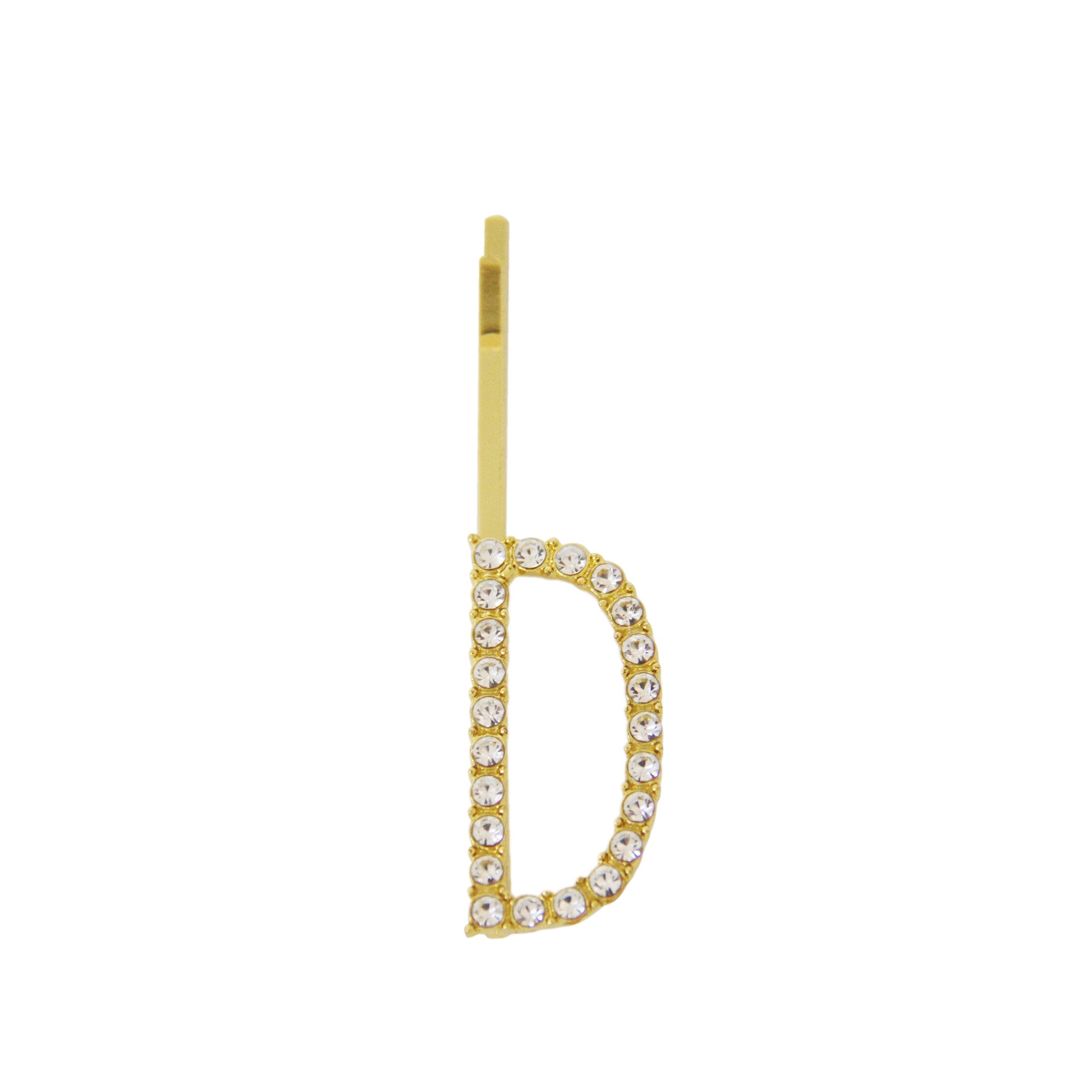 Gold and crystal letter 'D' hair slide on a white background