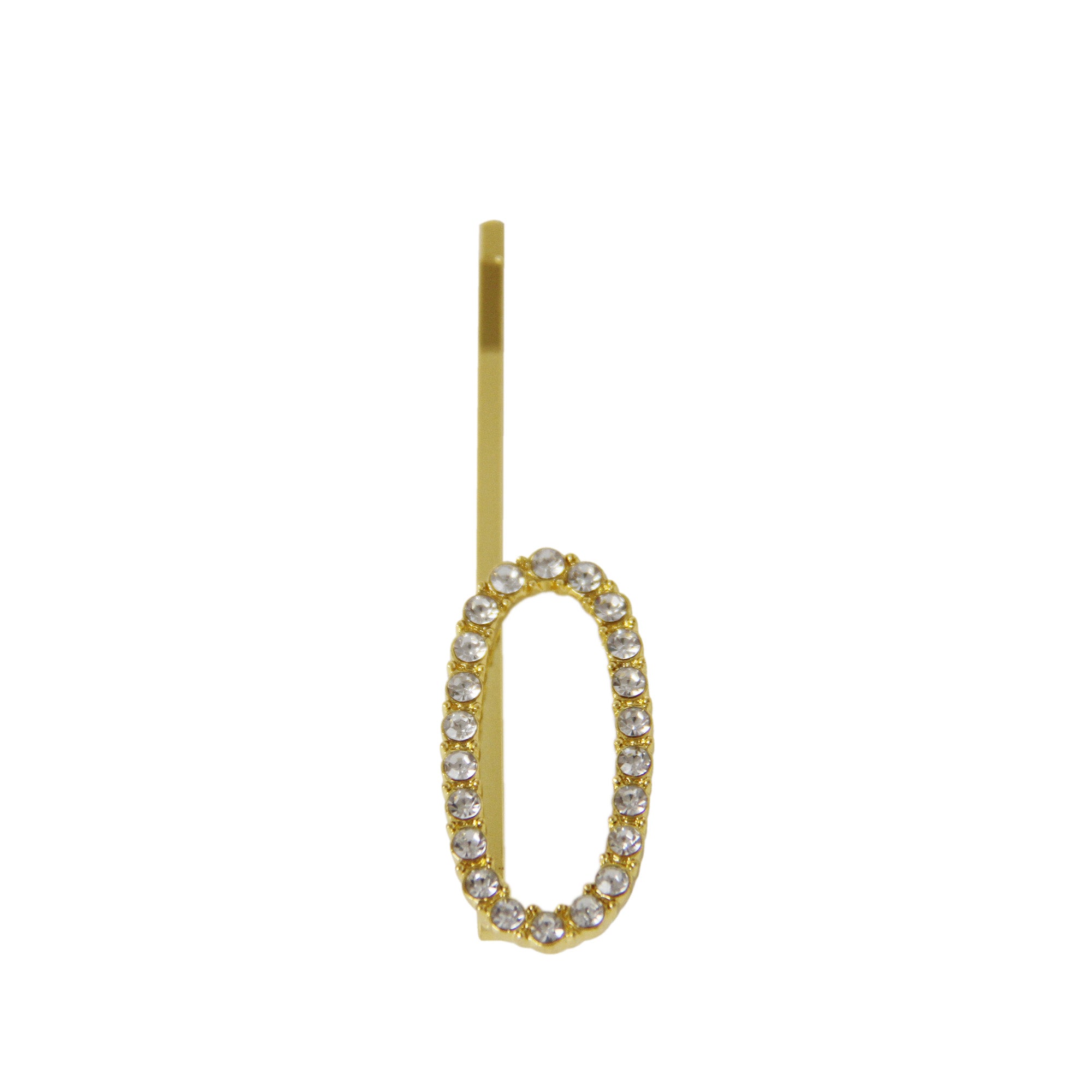 Gold and crystal letter 'O' hair slide on a white background