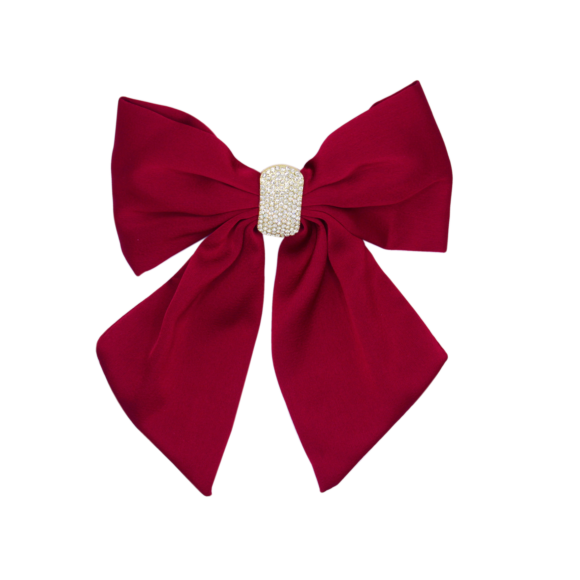 Red hair bow with a crystal pave center on a white background