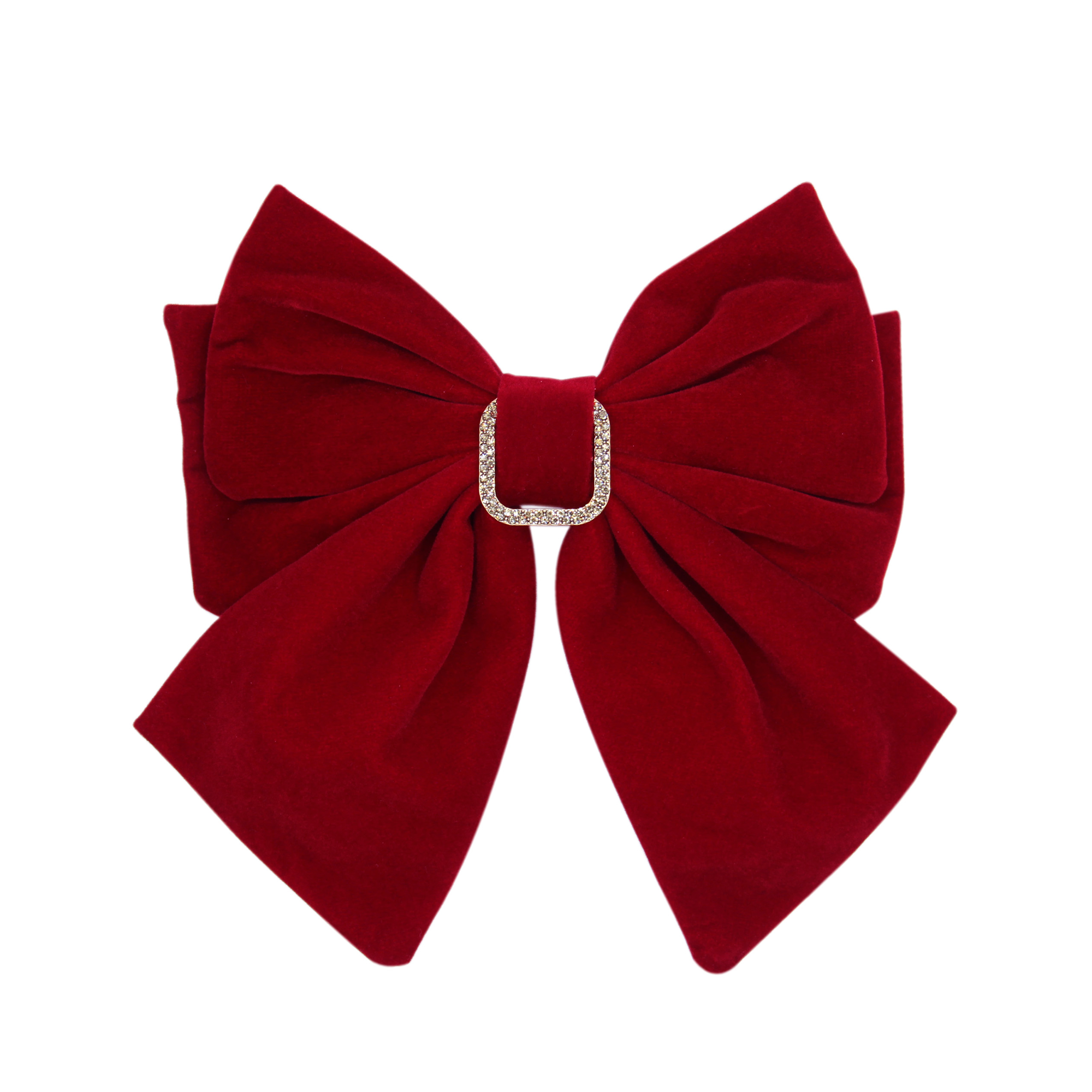Red velvet bow with a crystal detail on a white background