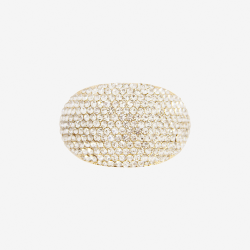 Oval Gold and crystal pave ponytail holder on an off white background