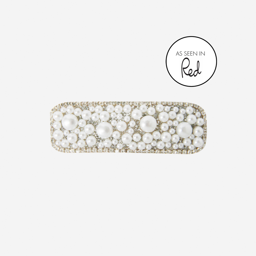 Pearl and crystal rectangle hair clip, with an as seen in Red Magazine logo, on an off white background