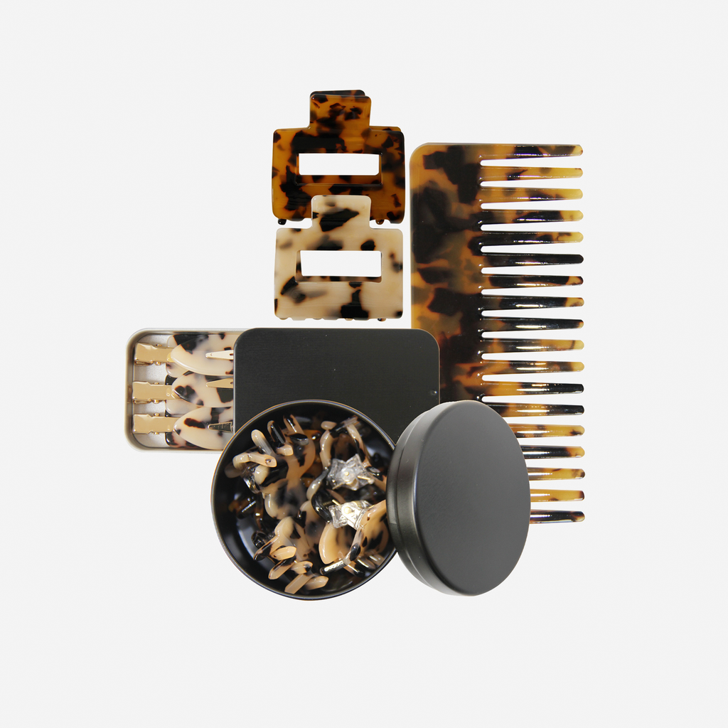 Curated tortoiseshell hair accessory gift set including non crease hair clips, hair claws, mini hair claws and hair comb, in keepsake tins and packaged in a beautiful gift box.
