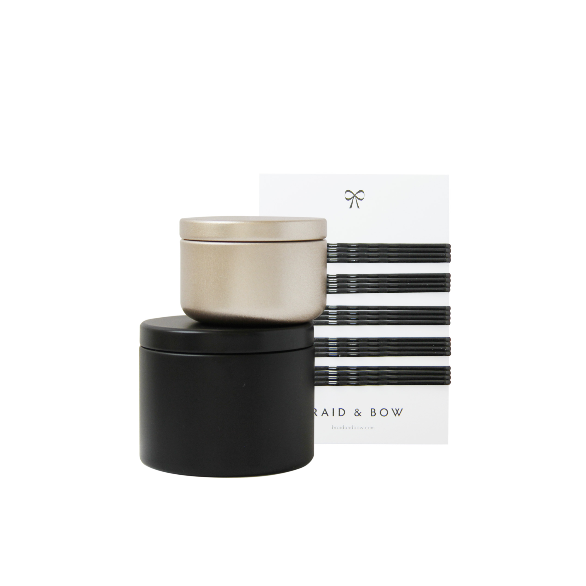 Braid & Bow Gift Set, showing a stack tins containg hair ties and mini hair claws and a set of 20 black kirby grips on a white background