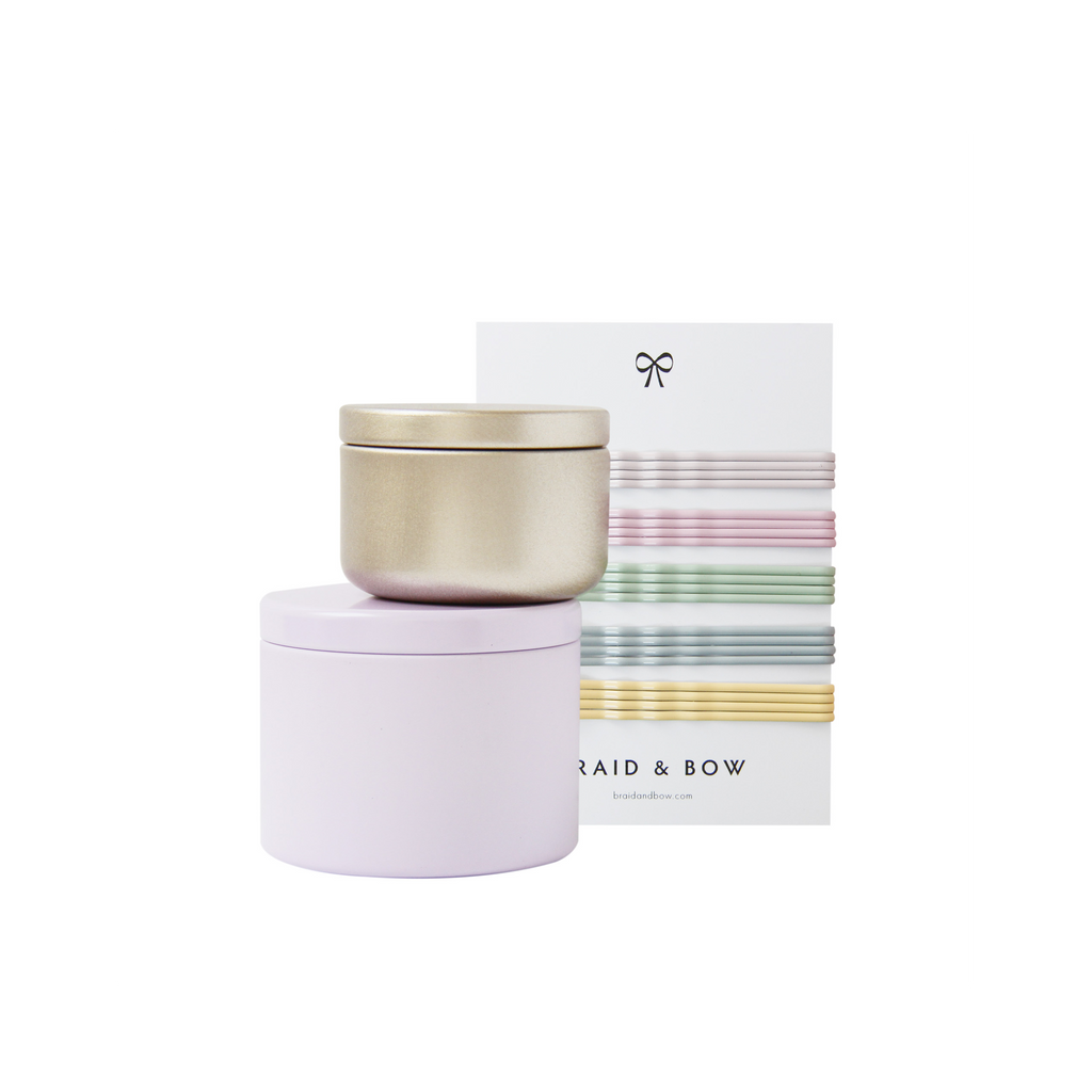 Braid & Bow Gift Set, showing a stack tins containg hair ties and mini hair claws and a set of 20 pastel kirby grips on a white background