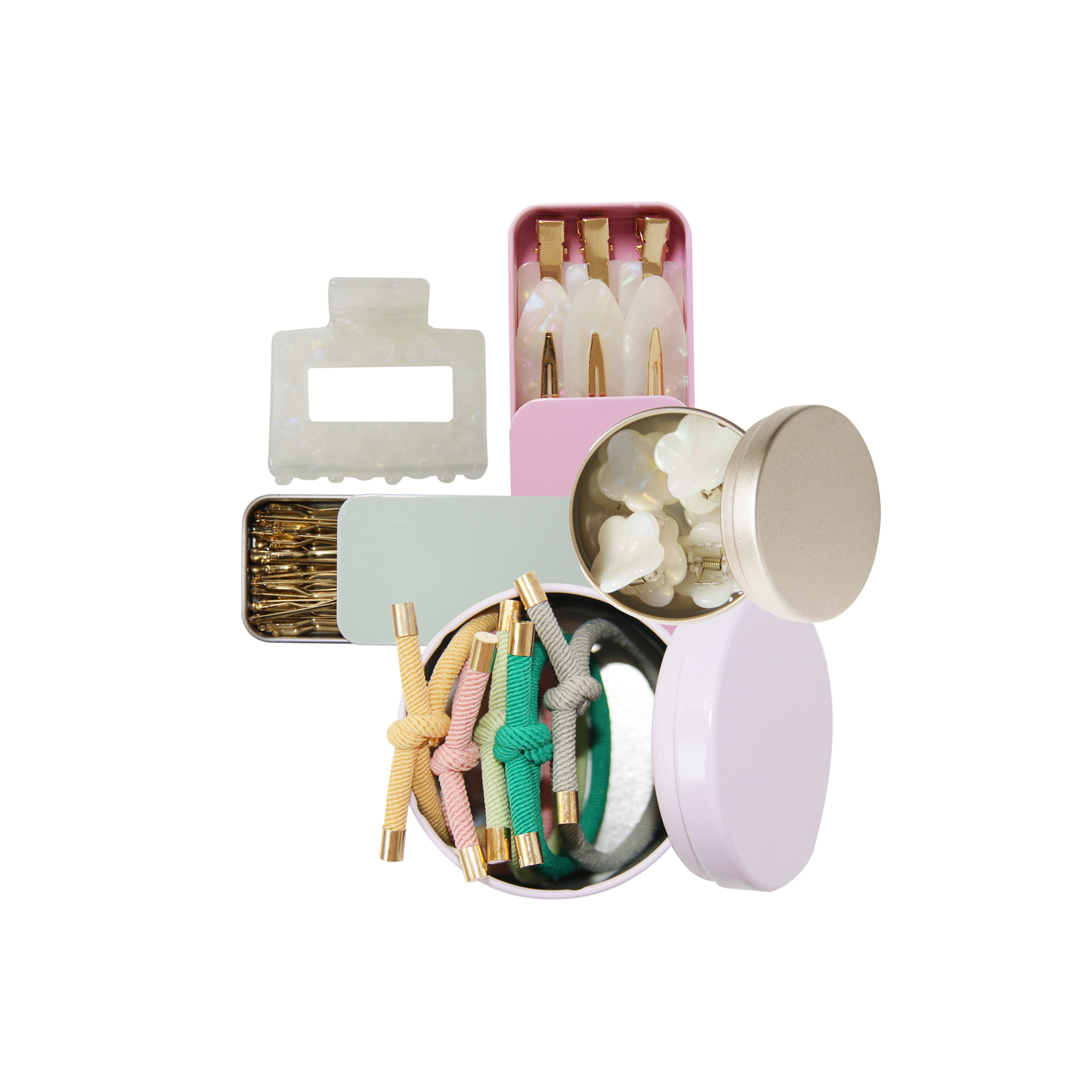 Set of hair accessories, showing hair ties, mini hair claws, kirby grips, a hair claw and a set of non crease hair claws, on a  white background