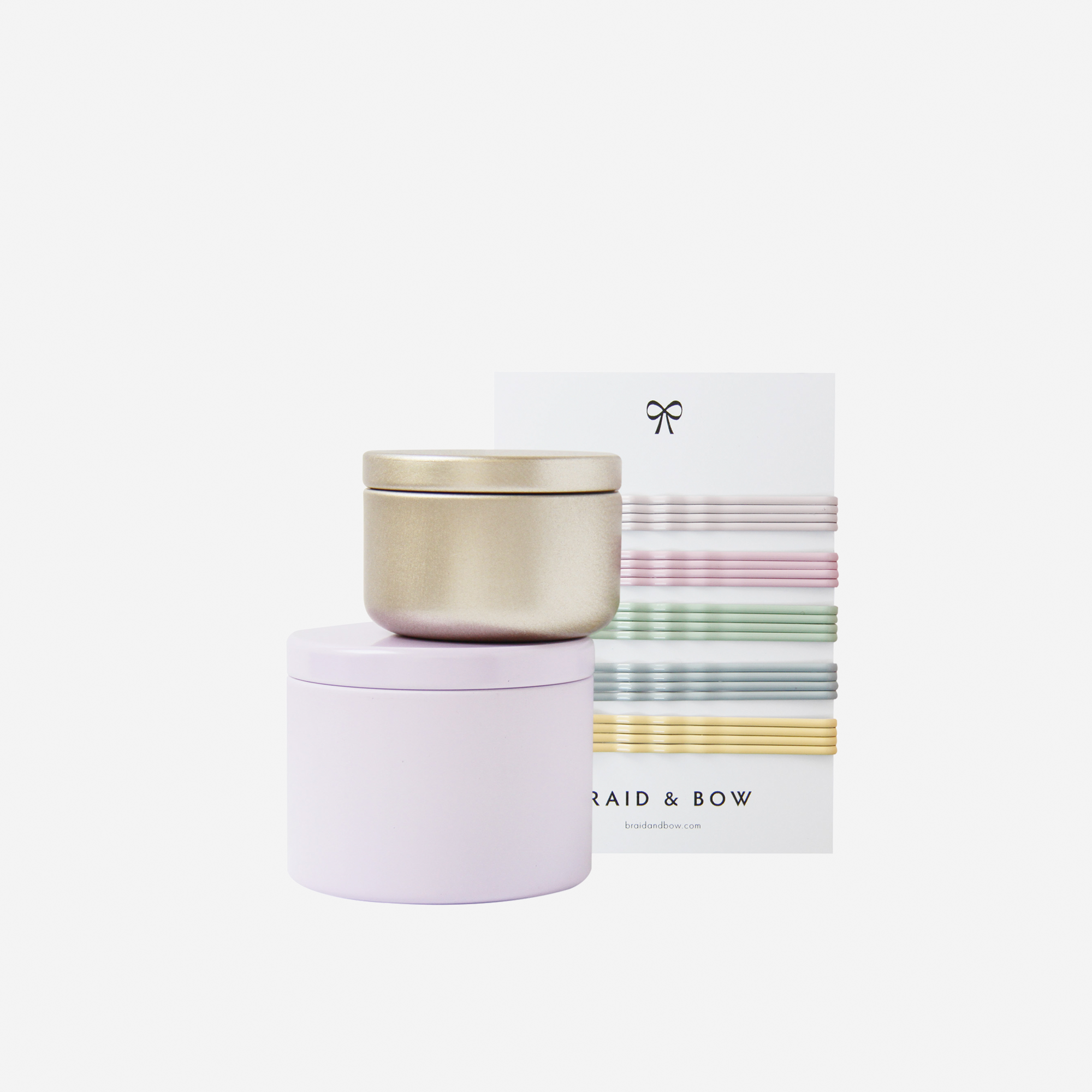 Curated hair accessory set including pastel hair slides, hair ties and hair claws, in keepsake tins and packaged in a beautiful gift box.
