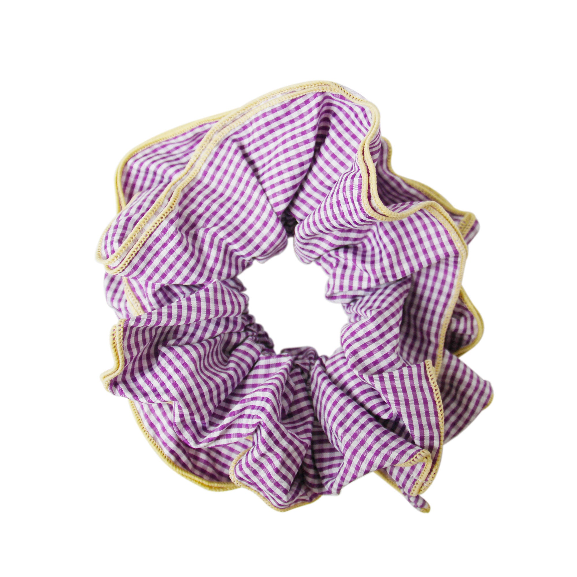 Purple gingham scrunchie with a yellow trim on a white background