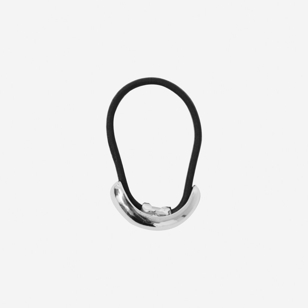 Glossy silver ponytail holder with a black hair elastic 