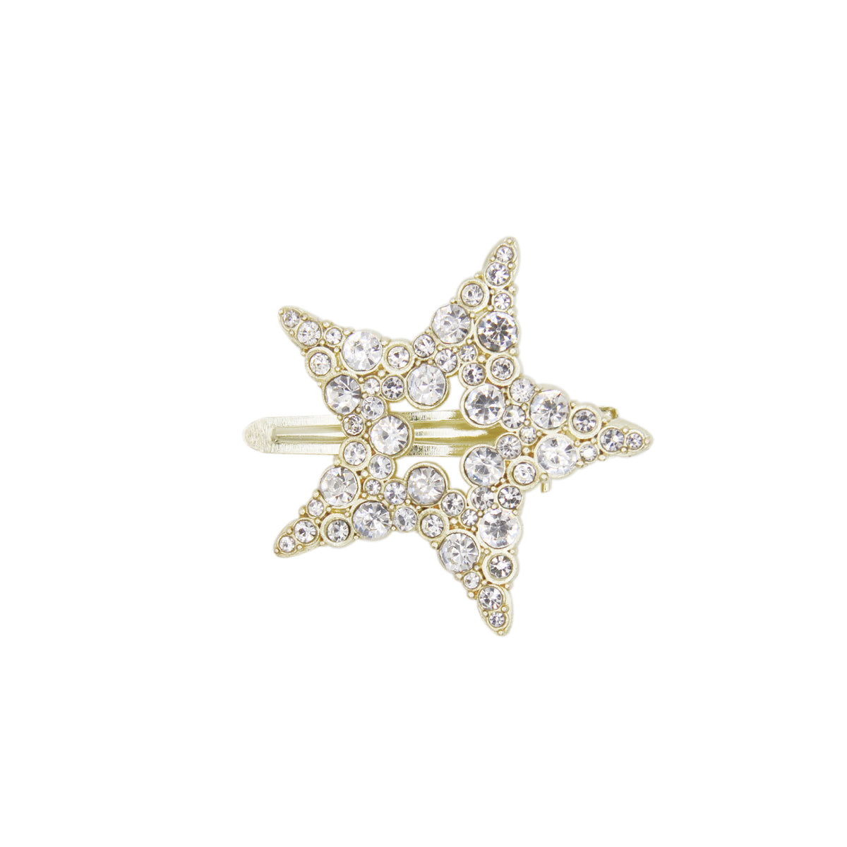 Gold and crystal star shapped hair clip on a white background