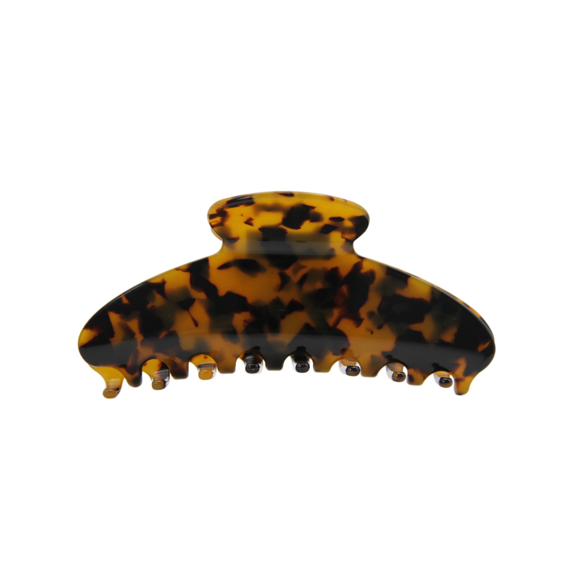 tortoiseshell hair claw on a white background