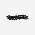 Jet black crystal hair clip that's designed like ivy on an off white background