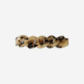 Light Tortoiseshell hair clip with a link design on an off white background
