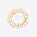 Mini Pearl beaded hair tie on an off white background