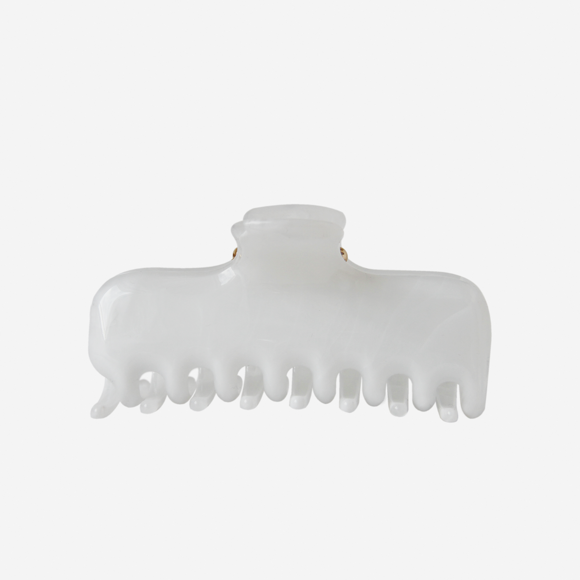 White swirl hair claw on an off white background