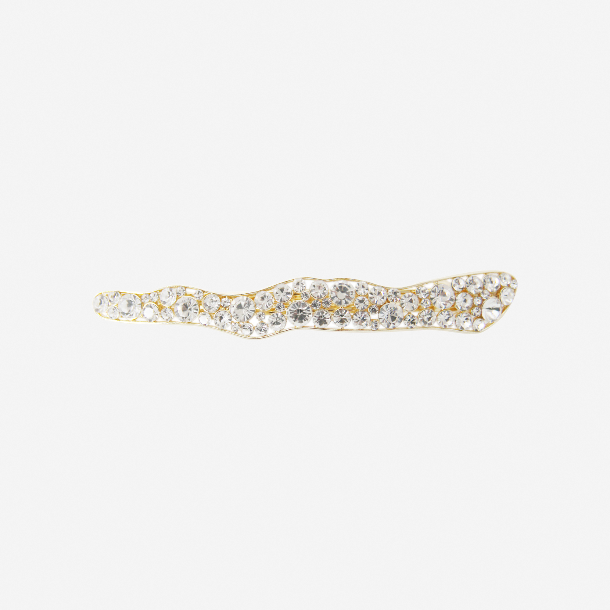 elongated pearl and crystal hair clip with an organic shape on an off white background
