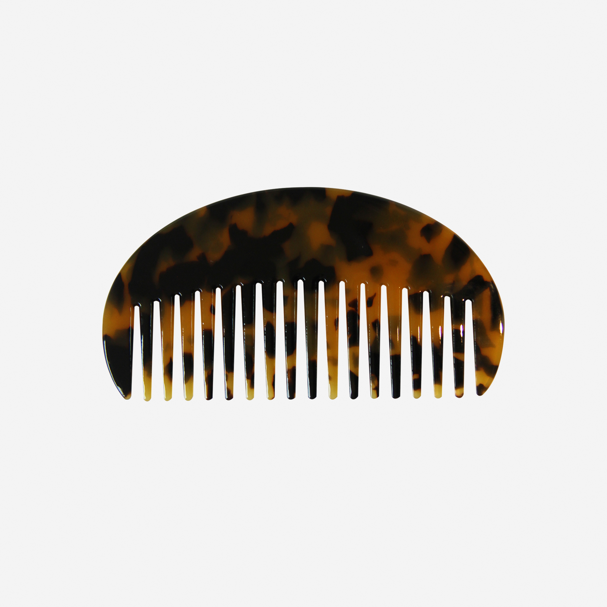 Oval dark tortoiseshell wide tooth resin hair comb that's great for detangling and styling