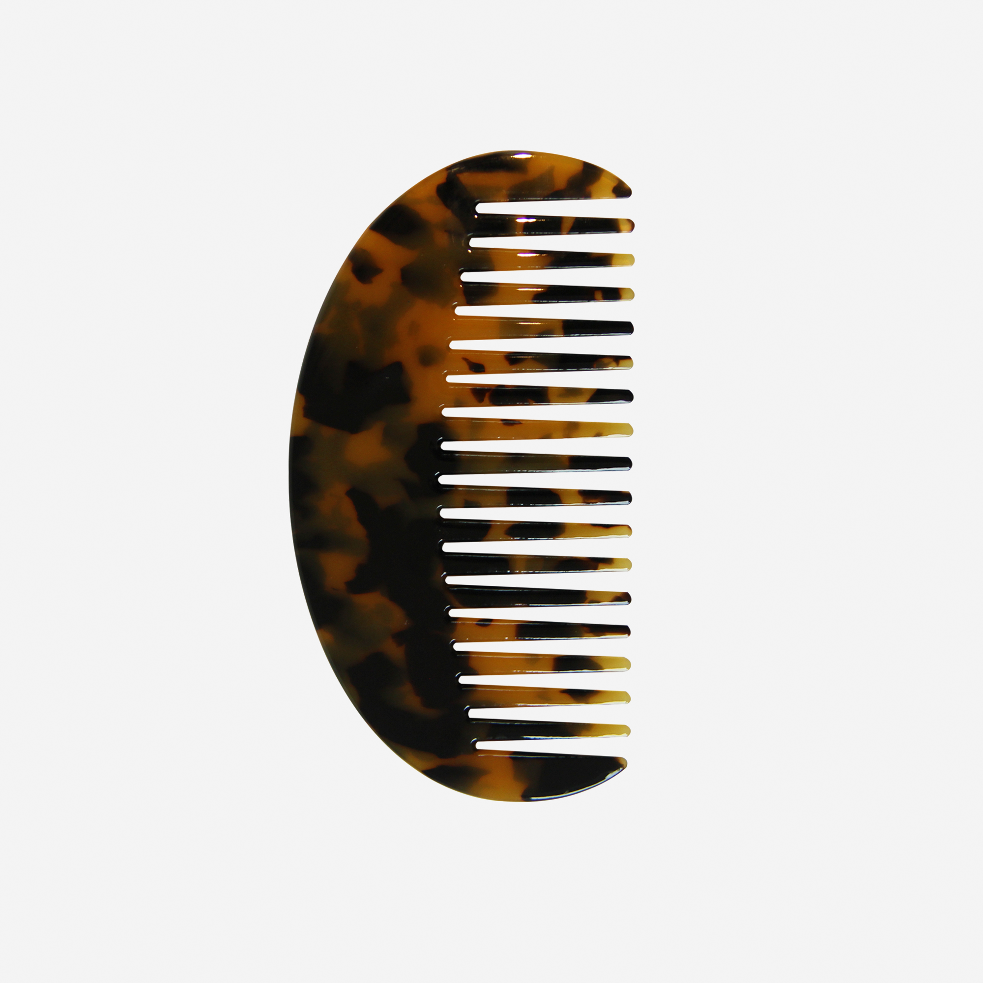 Oval dark tortoiseshell wide tooth resin hair comb that's great for detangling and styling