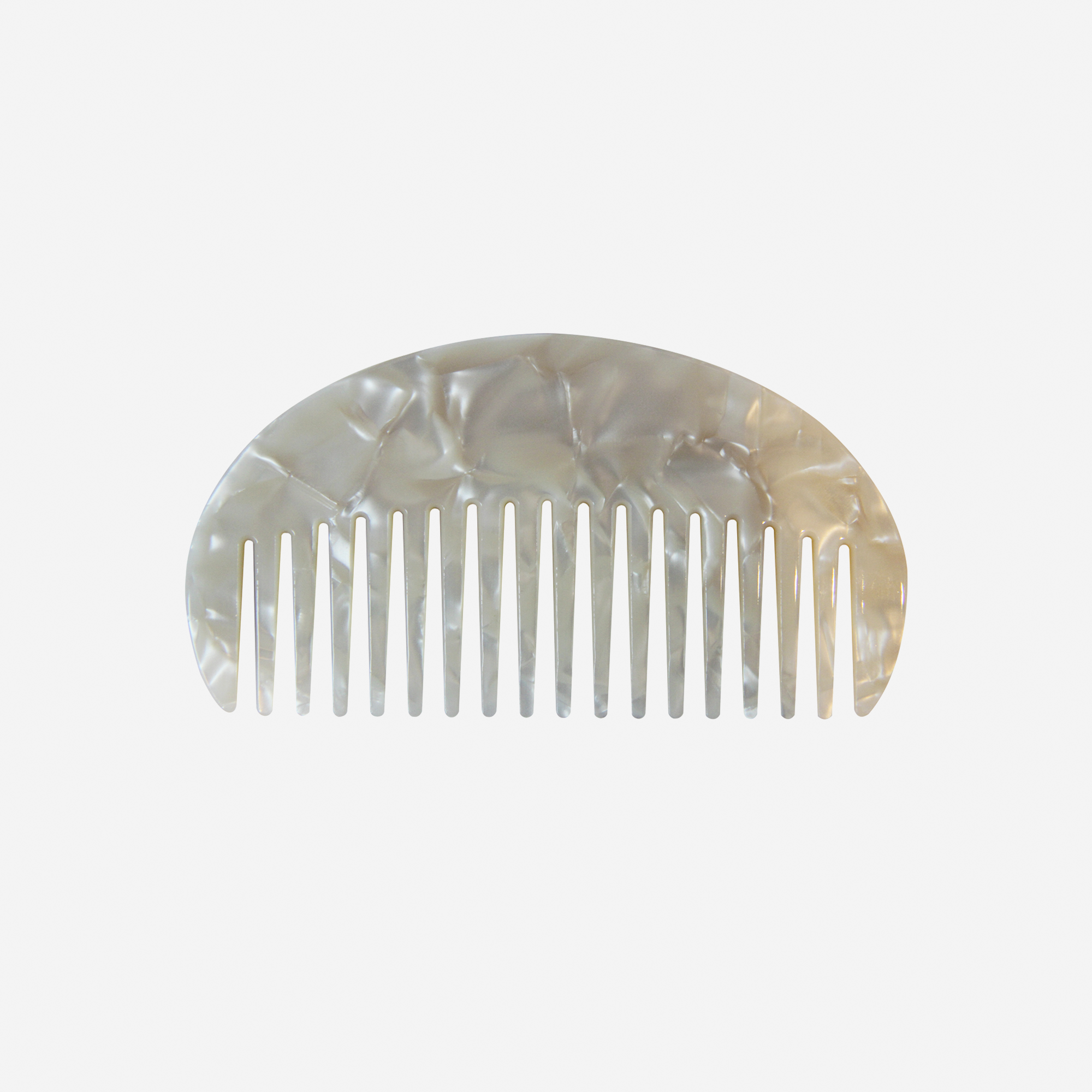 Oval mother of pearl wide tooth resin hair comb that's great for detangling and styling