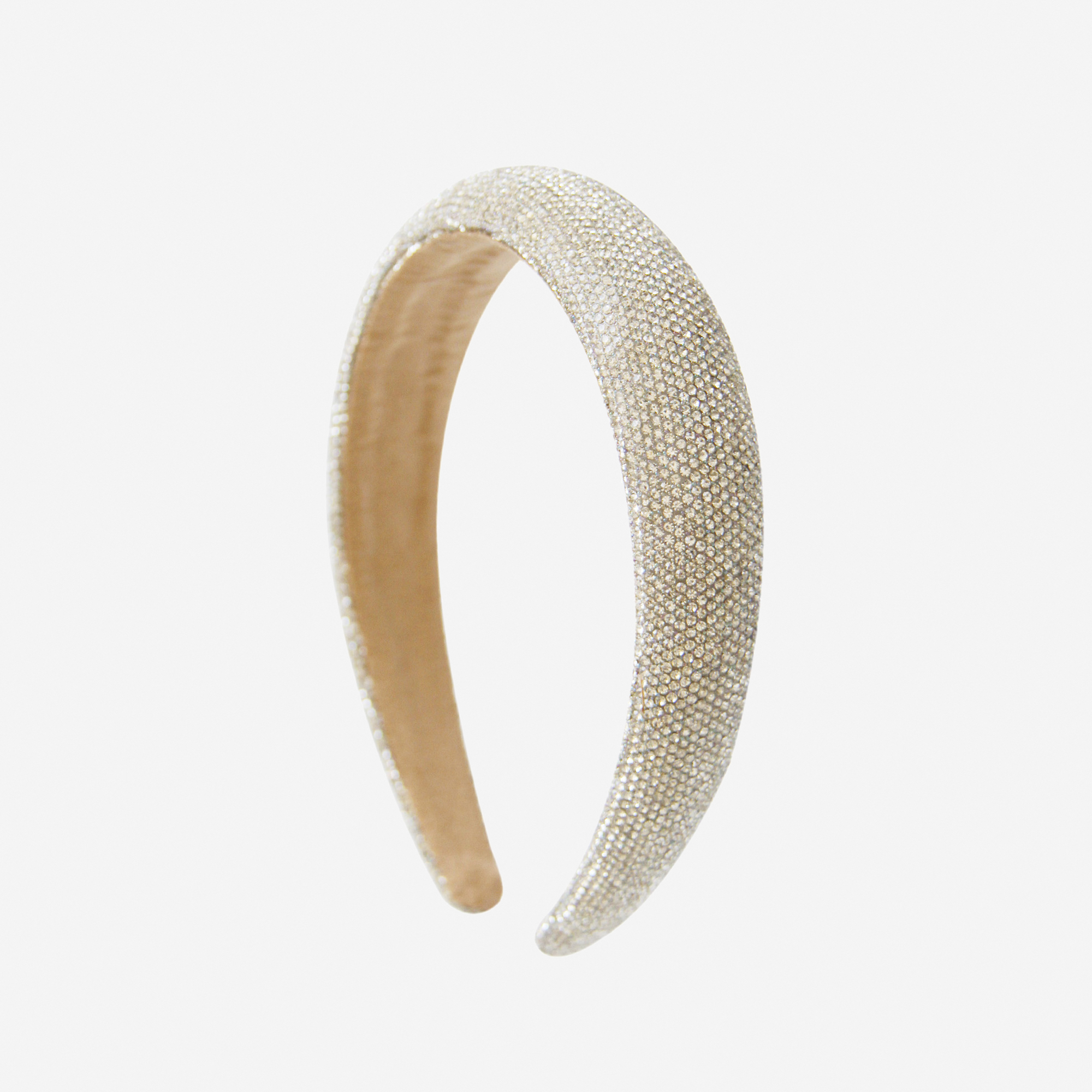 Crystal pave headband on an off white background