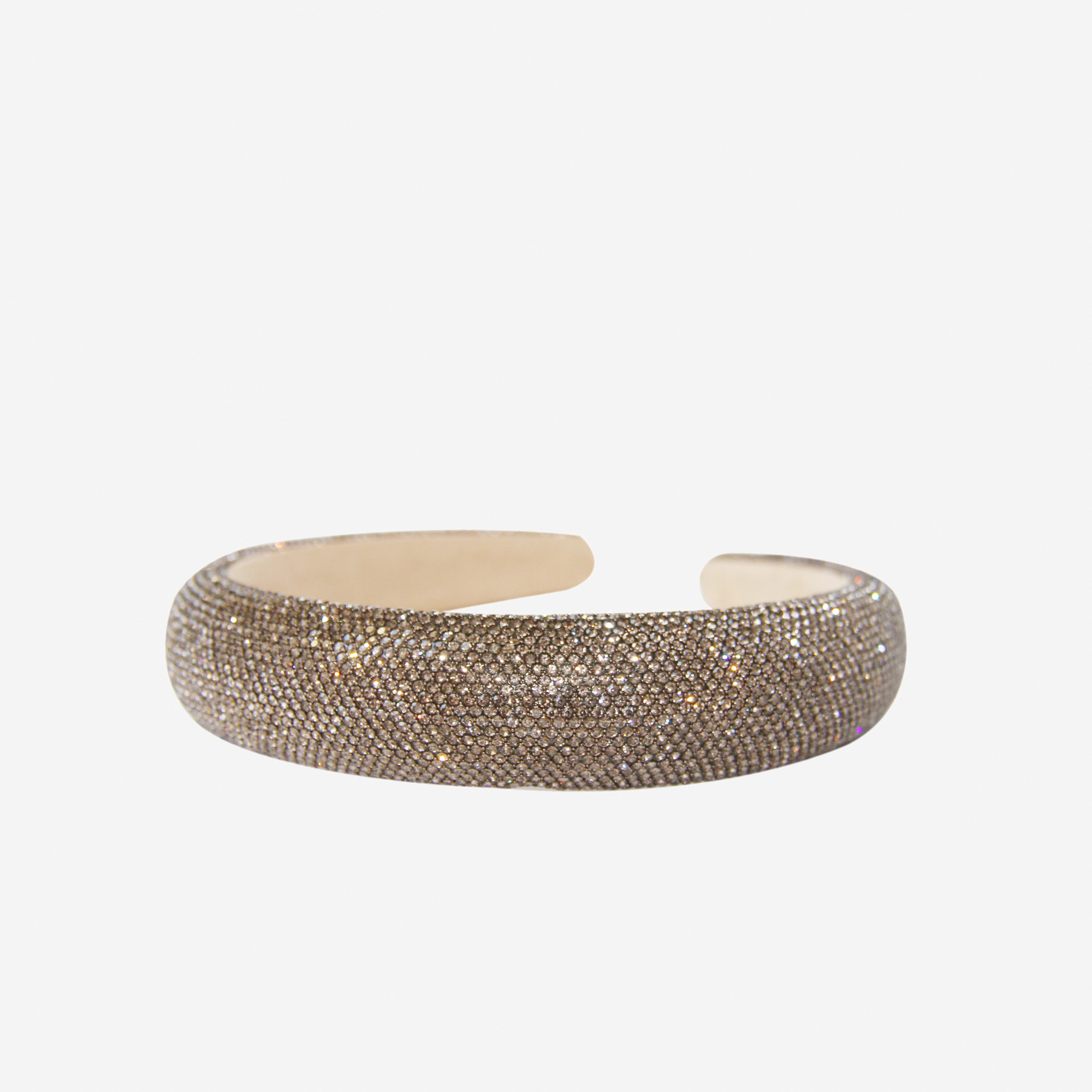 Smokey quartz crystal pave headband on an off white background