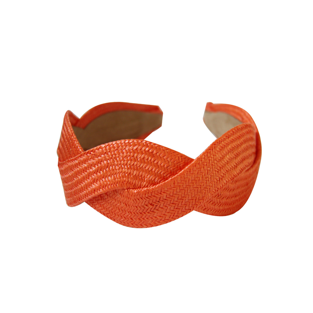 Orange raffia wave hairband on a white bacground