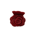 Red rose-shaped hair claw on a white background