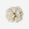 Cream ruffle and frill scrunchie on an off white background
