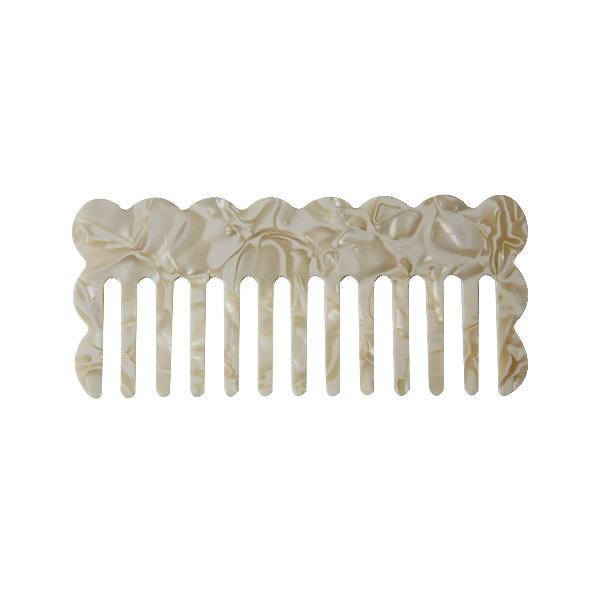 Scalloped edged resin mother of pearl hair comb on a white background