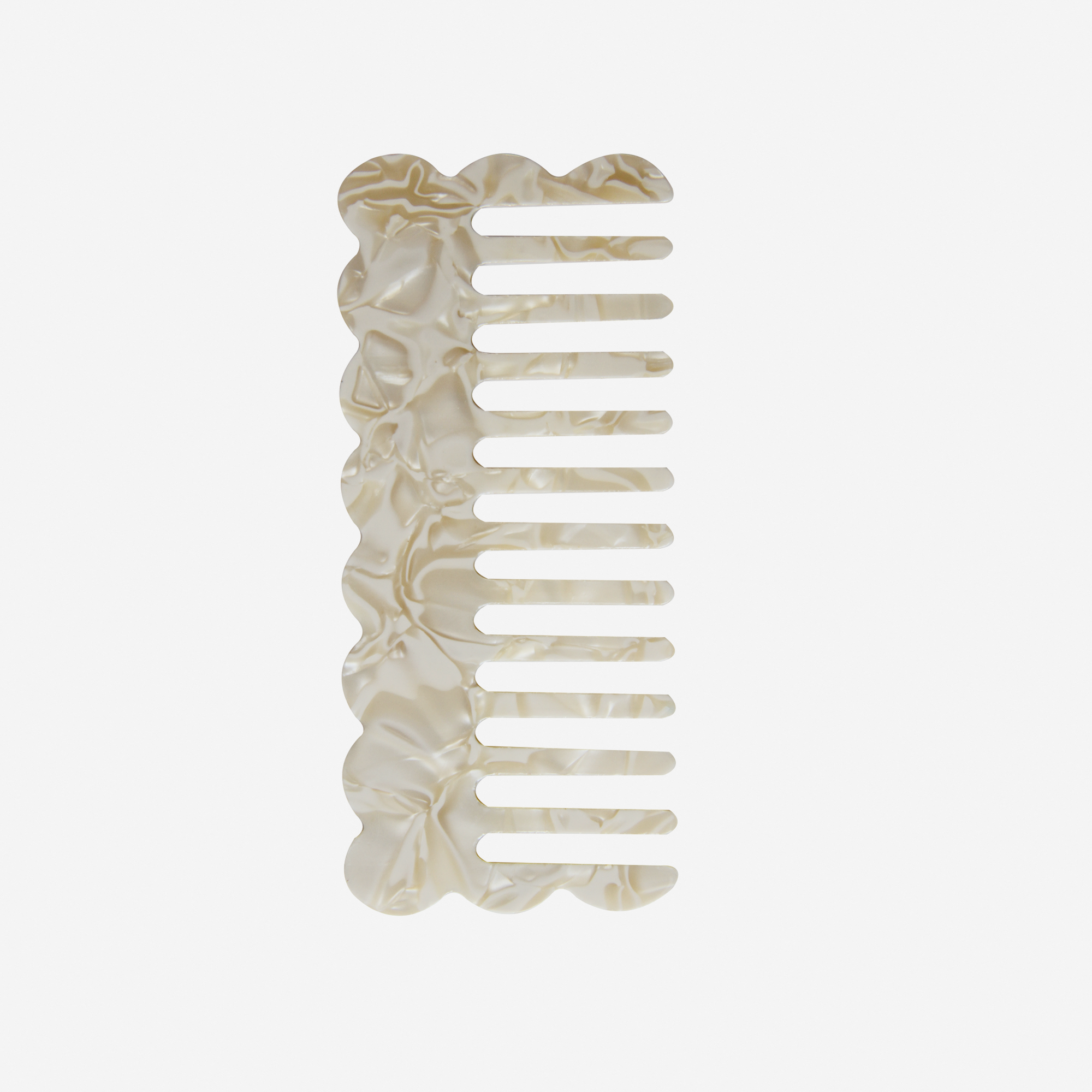Scalloped mother of pearl wide tooth resin hair comb that's great for detangling and styling