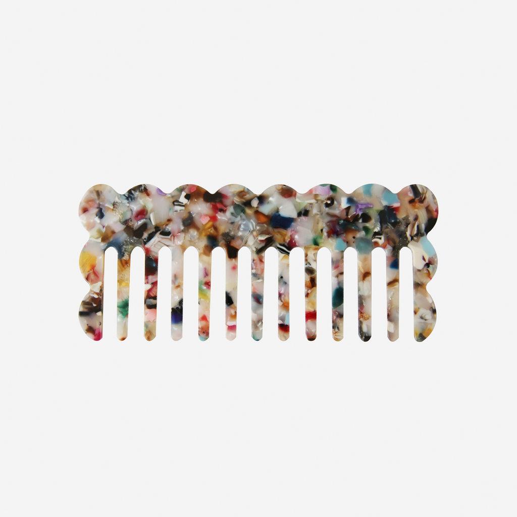 Scalloped multi coloured wide tooth resin hair comb that's great for detangling and styling