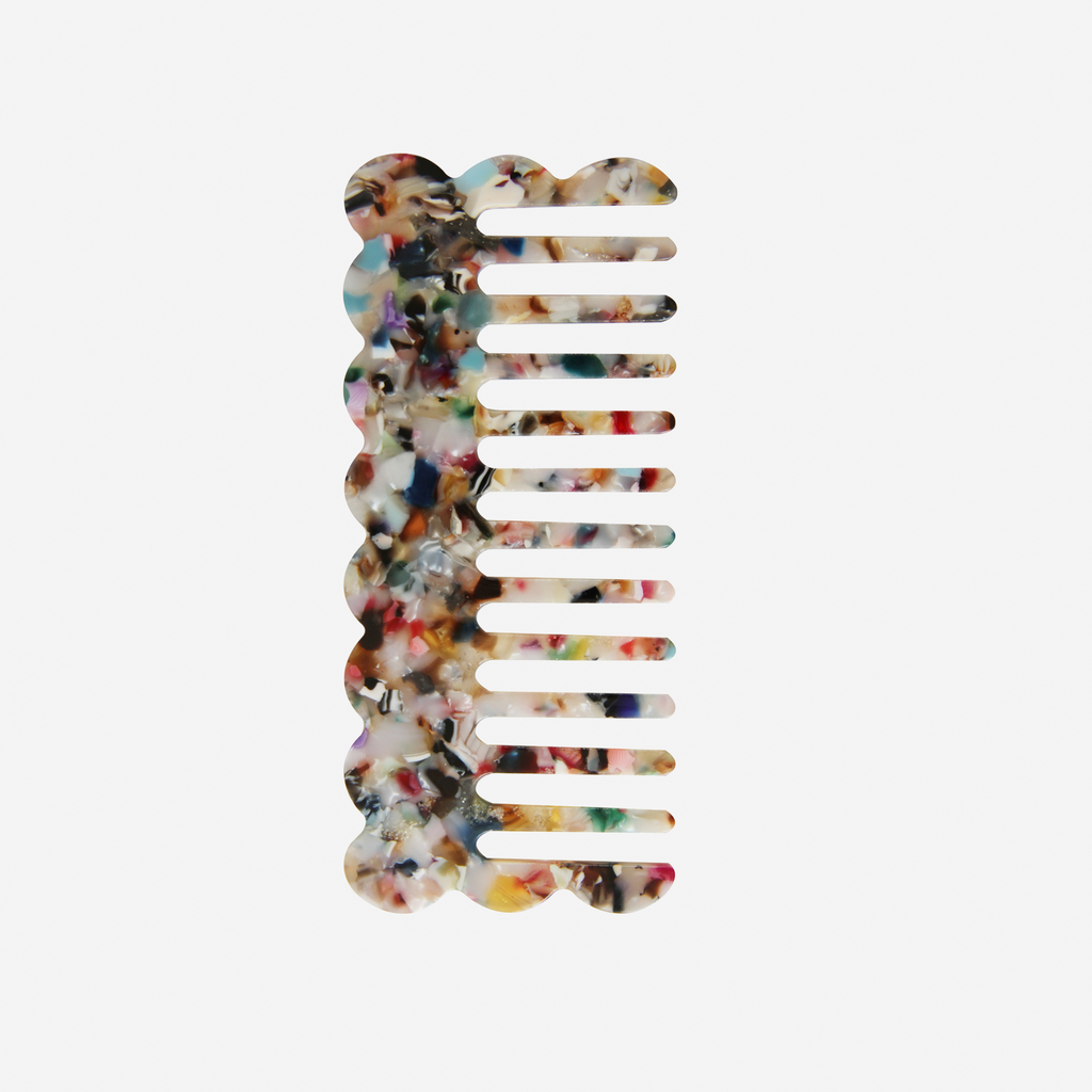 Scalloped multi coloured wide tooth resin hair comb that's great for detangling and styling
