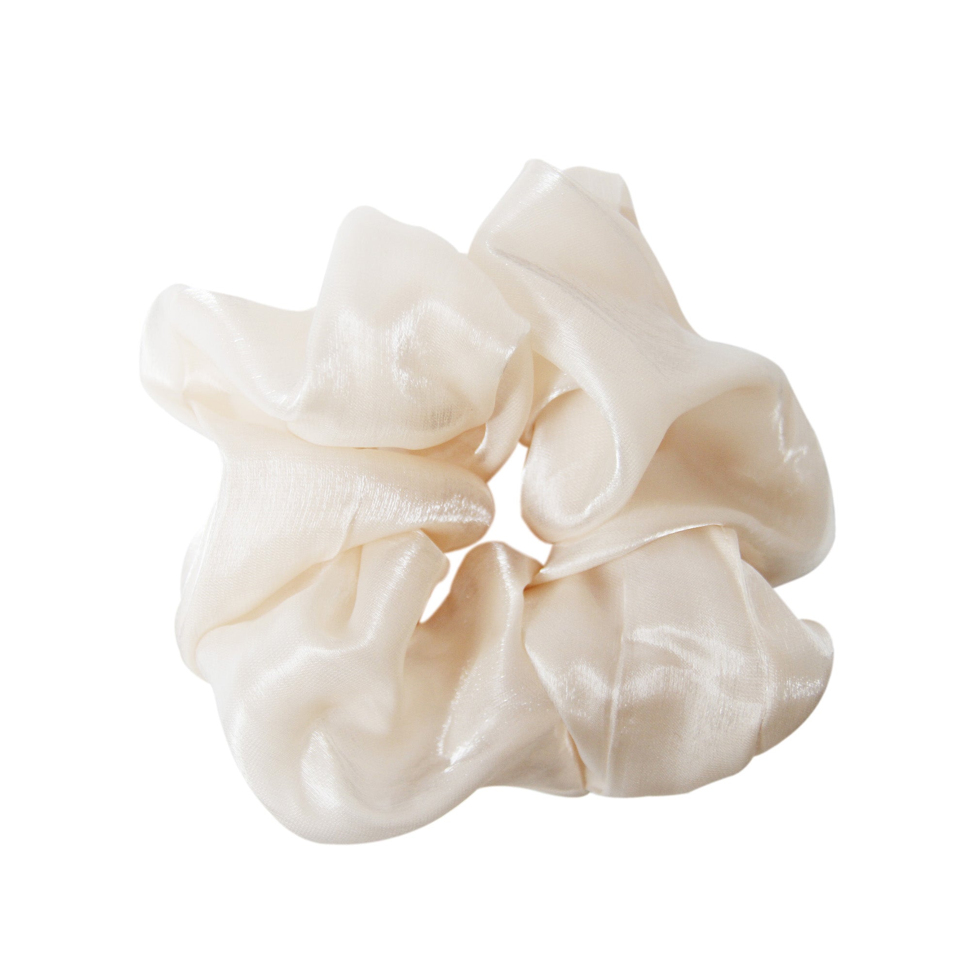 Cream scrunchie on a white background