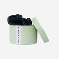 Set of 3 navy blue silk scrunchies in green keepsake tin, that they come packaged in and you can store them in, a great gift