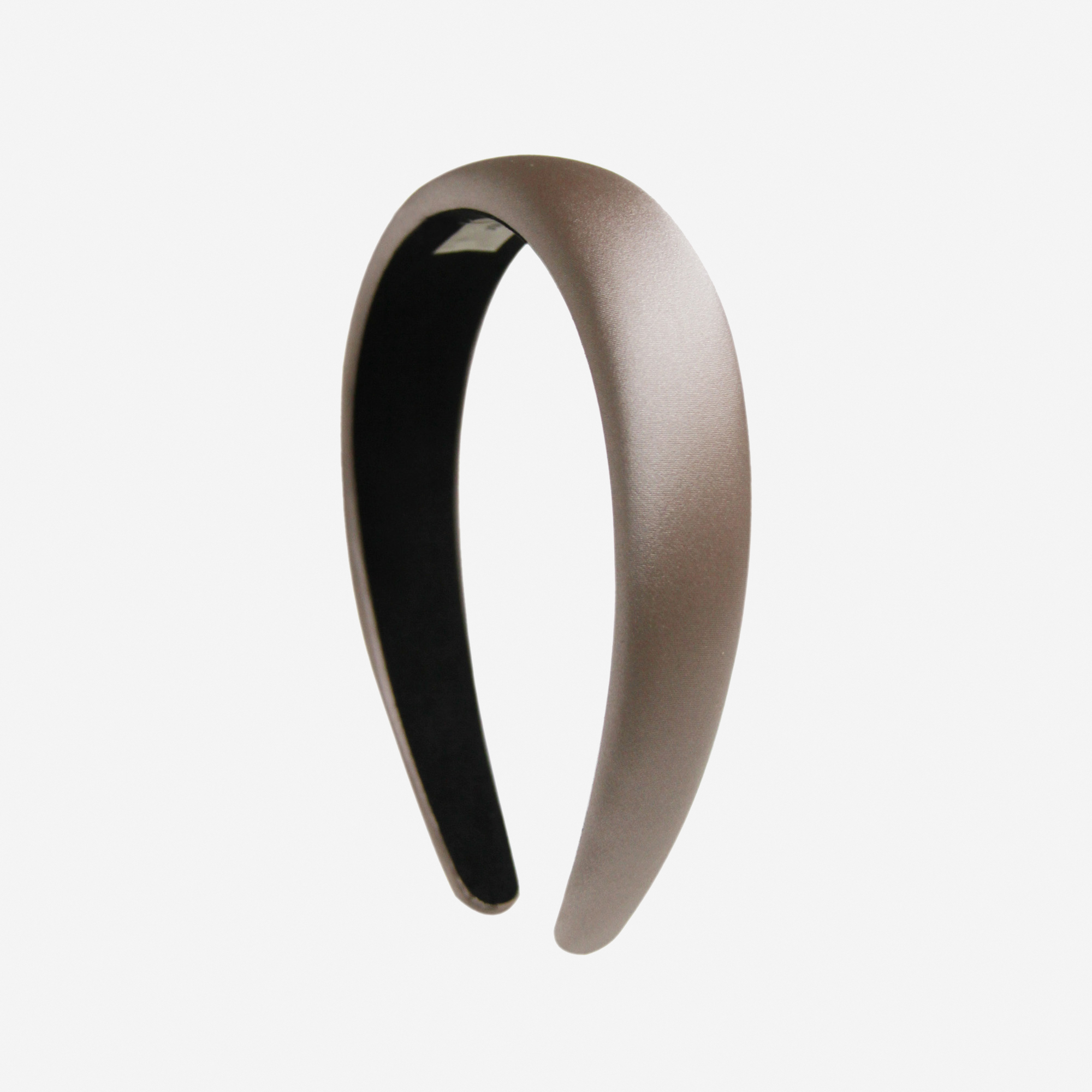 Taupe silk padded headband on an off white background
