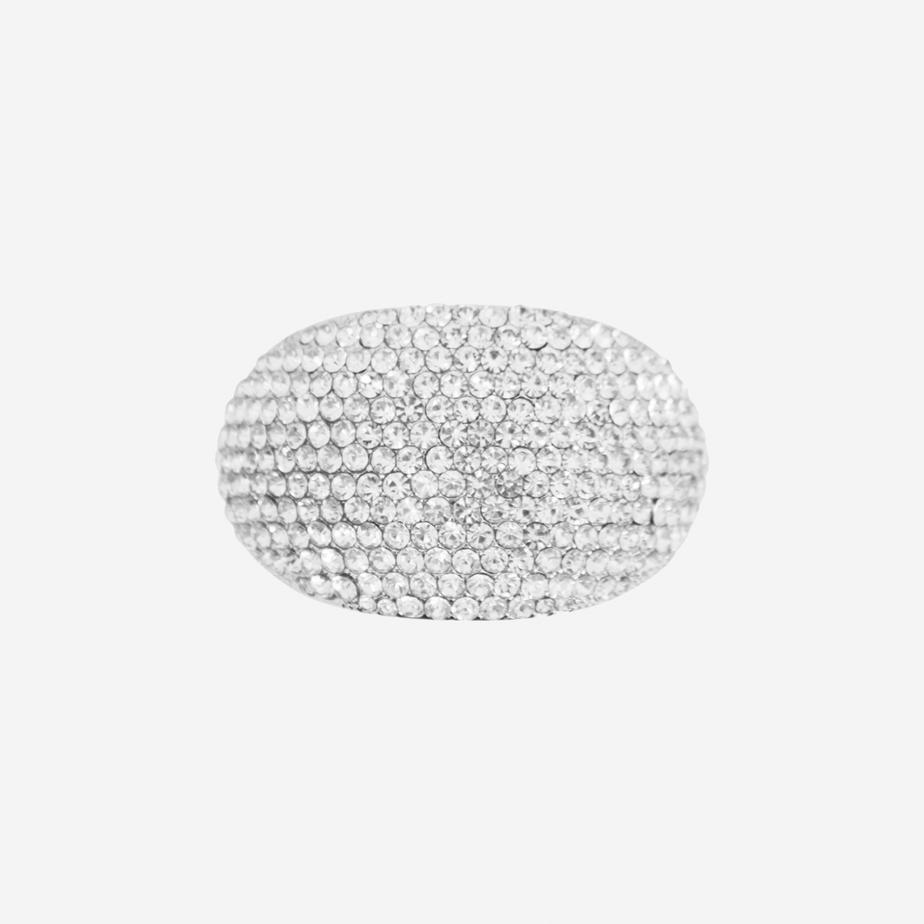 Oval silver and crystal pave ponytail holder,  back view showing the fastening, on an off white background