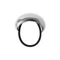 Oversized silver oval ponytail cuff on a black elastic hair tie on a white background