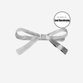 Silver ribbon hair clip, featuring an as seen in good housekeeping logo, on an off white background