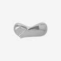 Silver teardrop hair clip on an off white background