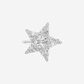 Silver and crystal hair clip on an off white background